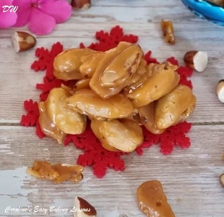 Extra close overhead shot of a stack of candy Brazil nuts - called Buttered Brazils.