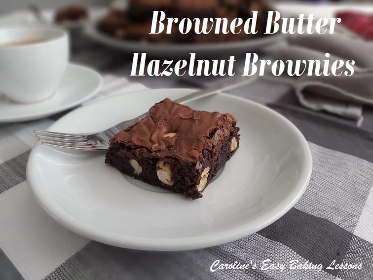 Hazelnut browned butter brownie square served.