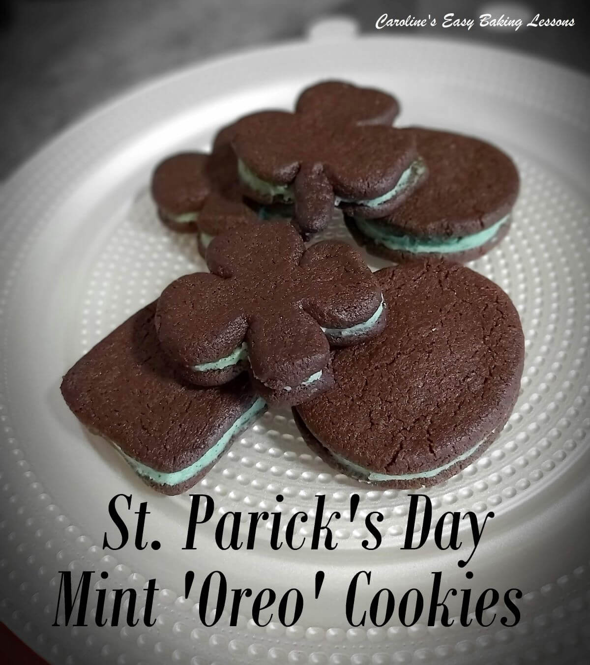 Close shot of plate with round and shamrock shaped, chocolate sandwich cookies with green filling with text 'St. Patrick's Day Oreos'.
