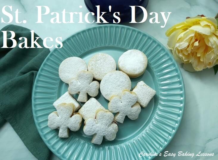 Plate of shamrock shaped sandwich cookies on a green plate with St Patricks day title.
