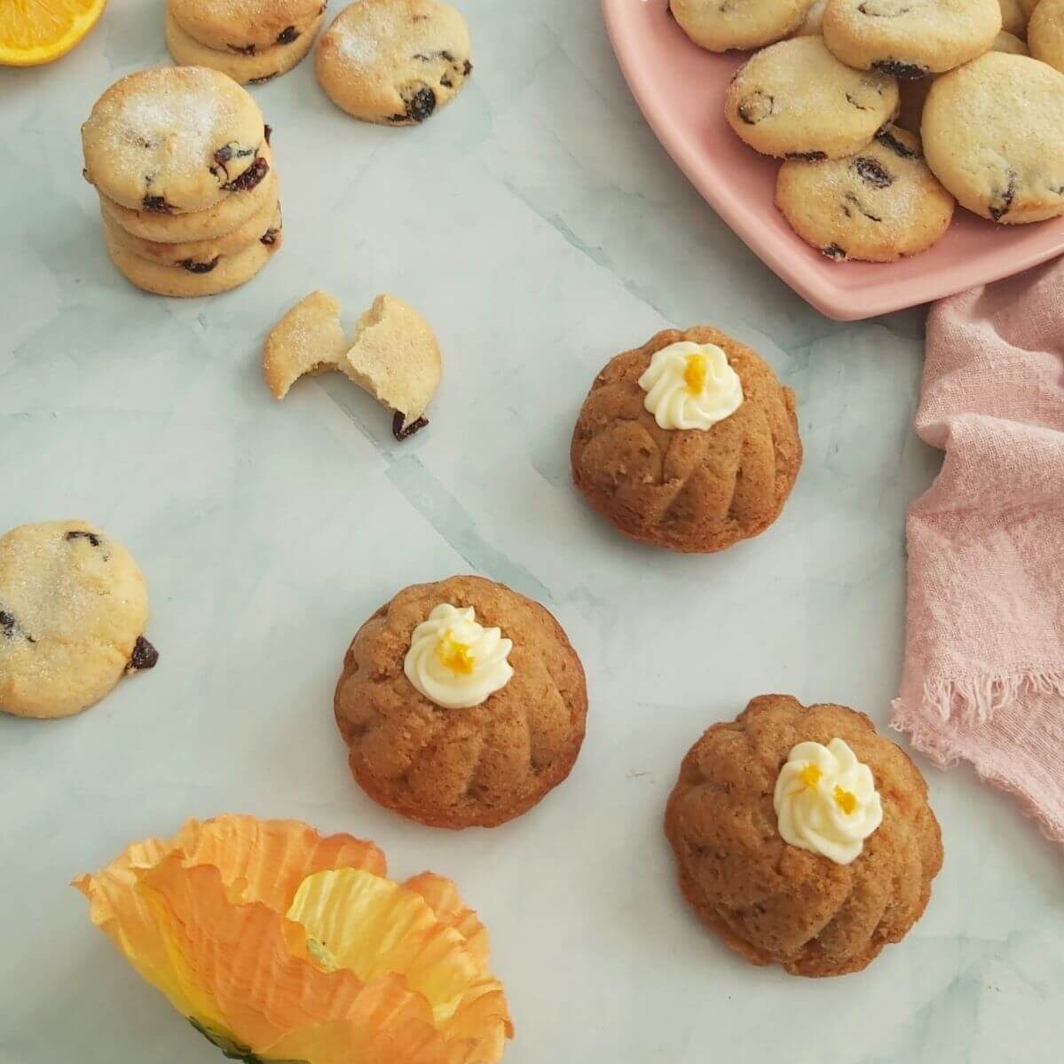 Mini carrot bundt cakes and broken cookies.