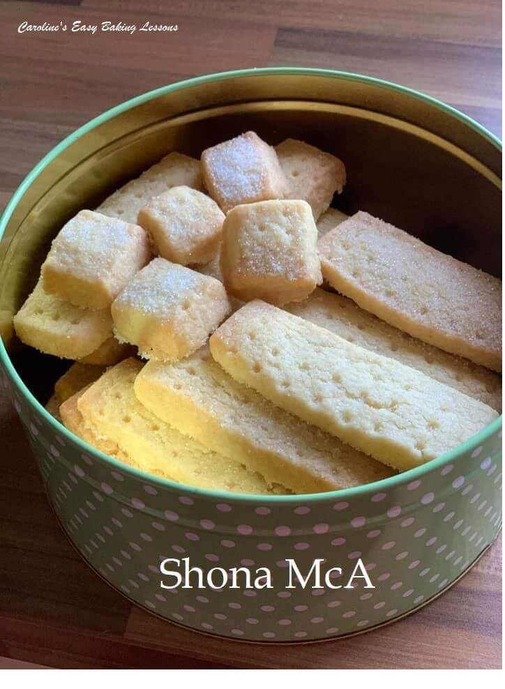 Biscuit tin with Scottish shortbread fingers and small cube bite-sized ones, by Shona.