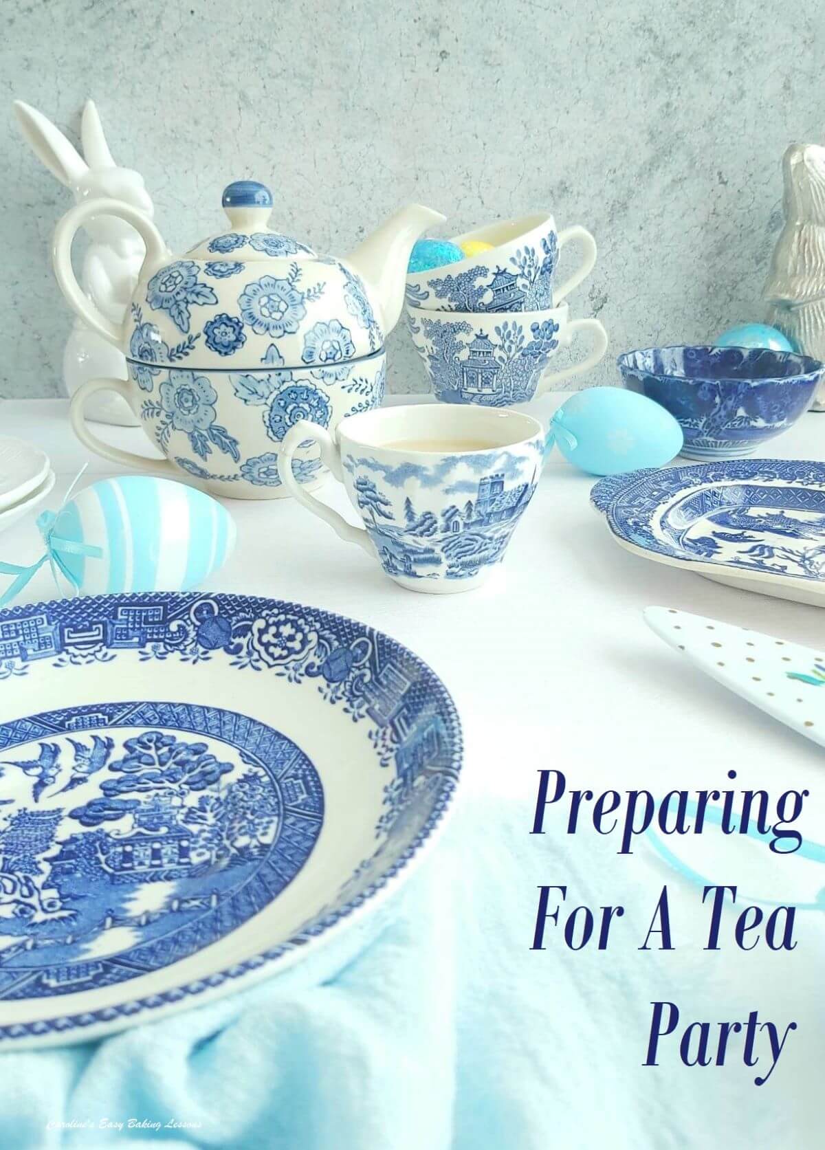 Blue and white Willow tea and crockery pieces with title planning the tea party.