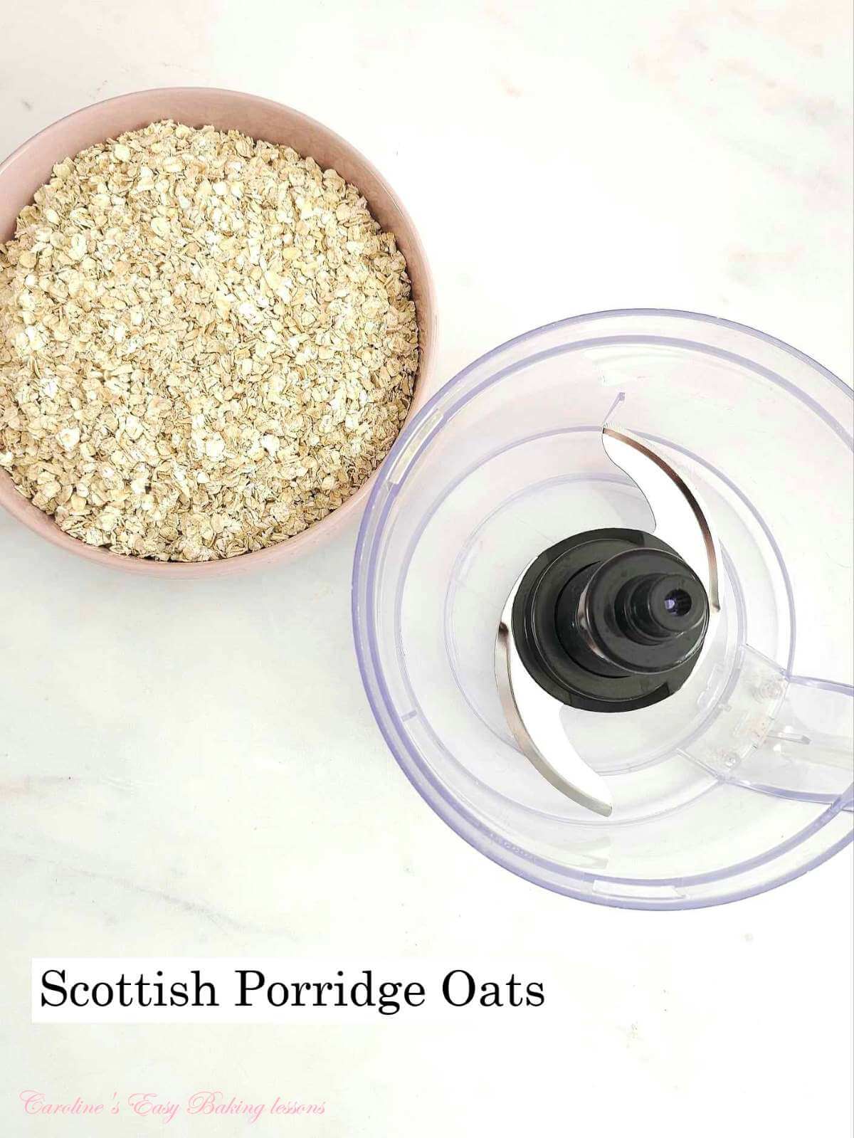 Overhead shot of a table with pink bowl of uncooked porridge oats and a food processor, with text 'Scottish porridge oats'.