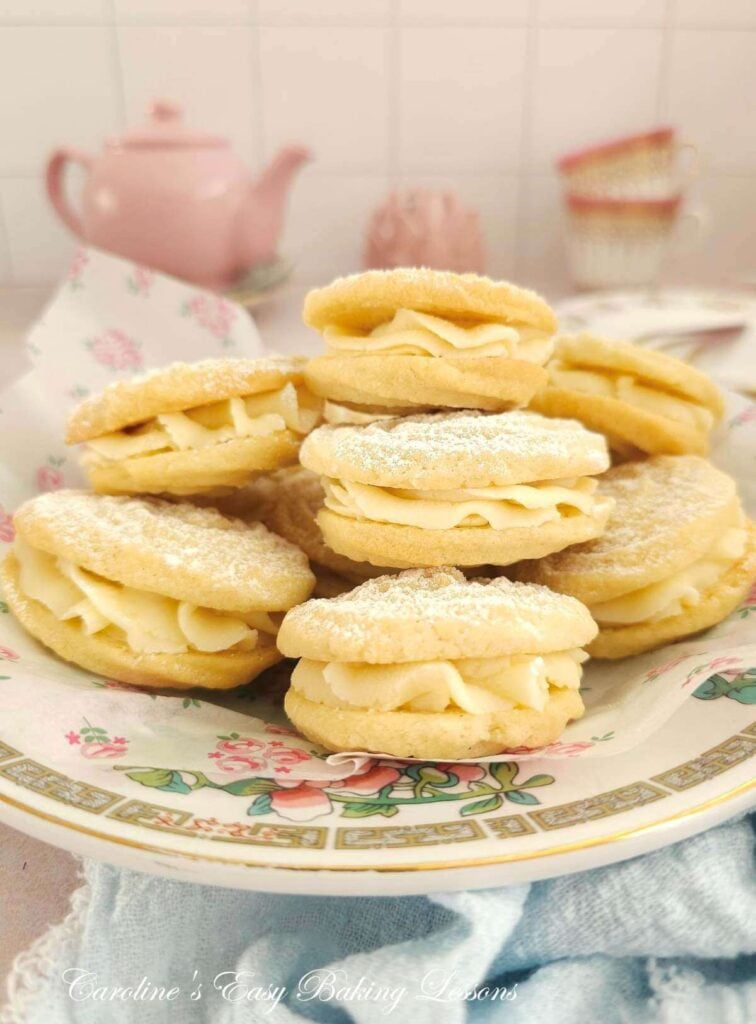 Vintage British crockery with stack of Viennese Biscuits stacked.