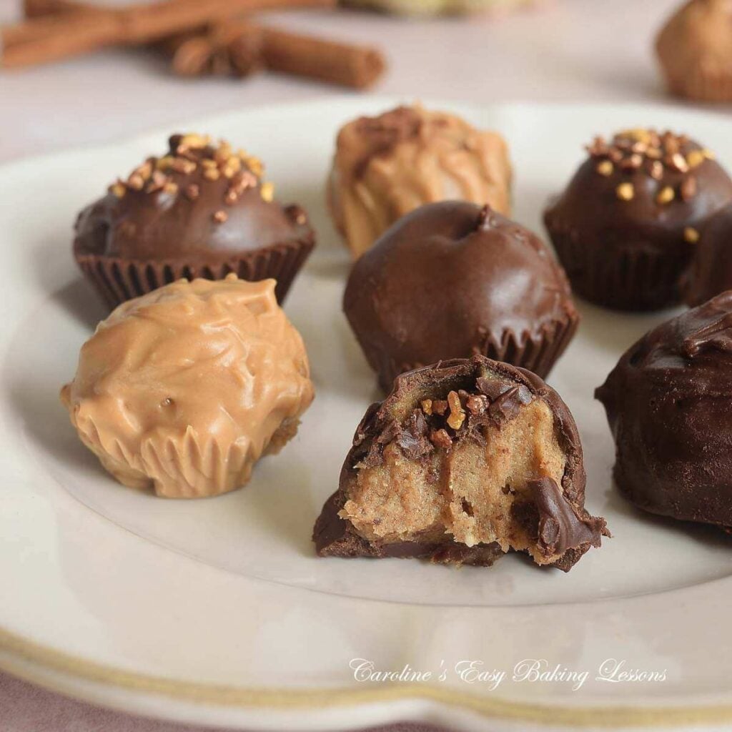 Extra close shot of chai truffles with one half-eatten showing texture.