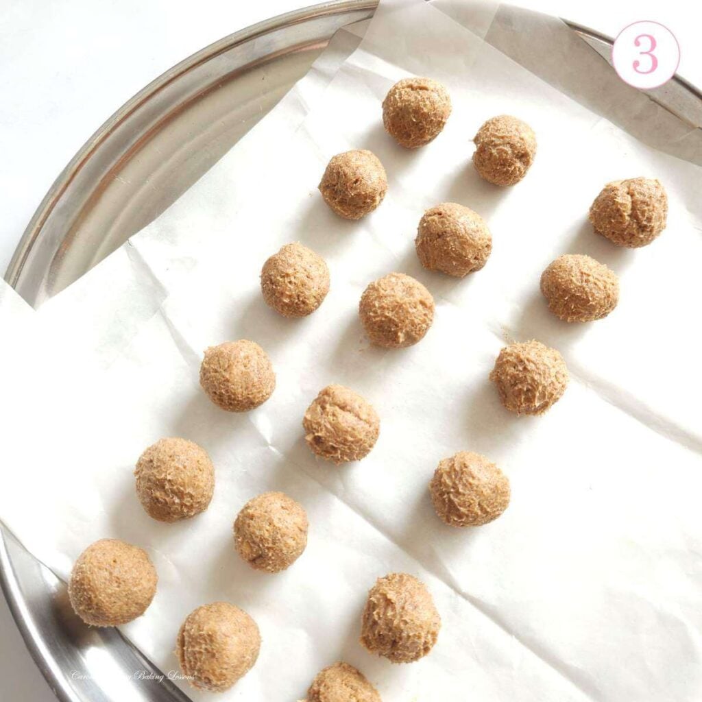 Shot of 18 rolled balls of cream cheese and cookie chai truffles before chilling, with text 'photo 3'.