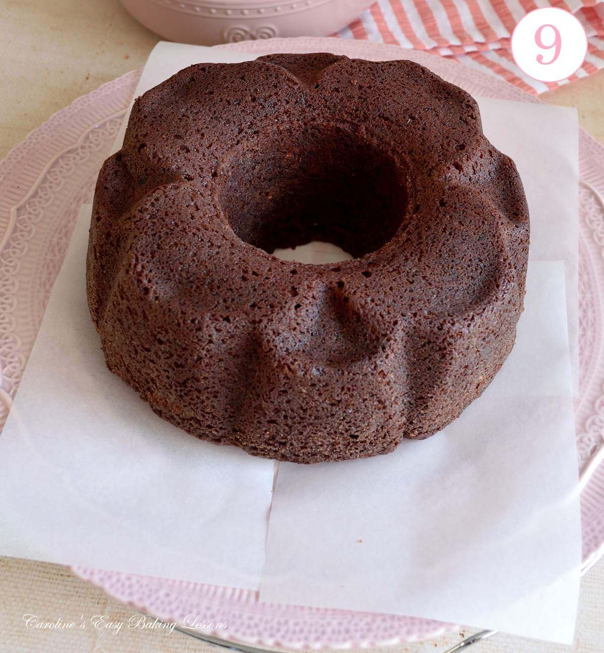 Image of Devil's chocolate bundt cake on paper before decorating with text 'photo 9'.